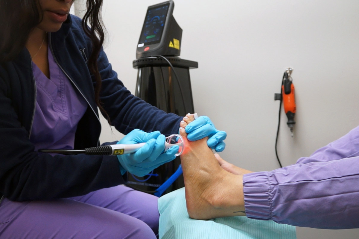 A podiatry specialist uses laser therapy to help with foot and ankle pain.